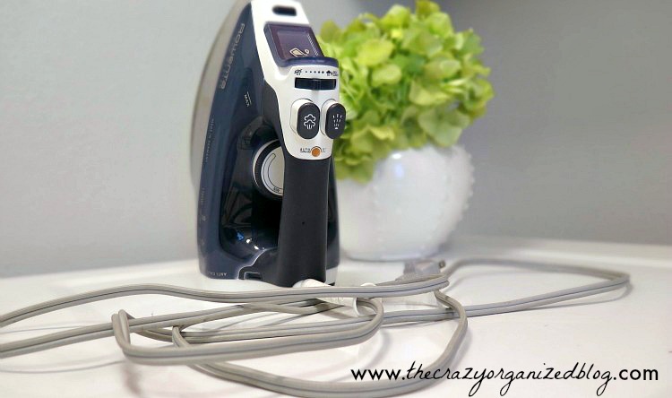 No more tangling ironing cords falling all over with this no sew DIY Ironing Cord Holder! Easy to make in only 15 minutes!