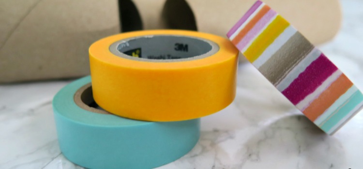 Surprising way to use toilet paper rolls to organize cords! Add a little washi tape for a bunch of color to this easy organizing trick!