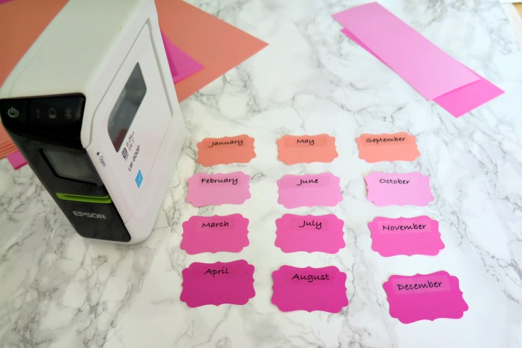 Make your own adorable greeting card organizer with your portable Epson label maker with iphone app! Sort your cards by month for easy access!