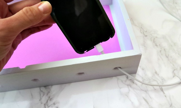 Too many electronics cluttering up your night stand or counter? Make your own adorable phone charging station! I even found my supplies at a thrift store!