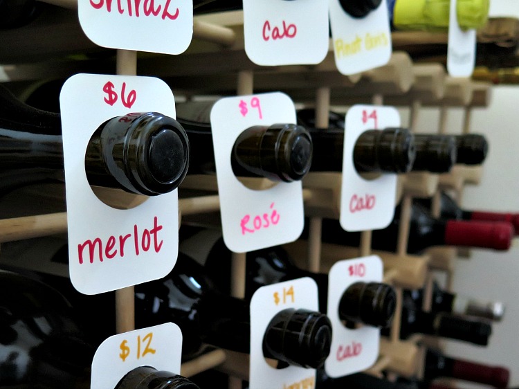 Make these fun DIY wine tag organizers to keep your wine stash organized. You'll now be able to quickly find the wine you're looking for!