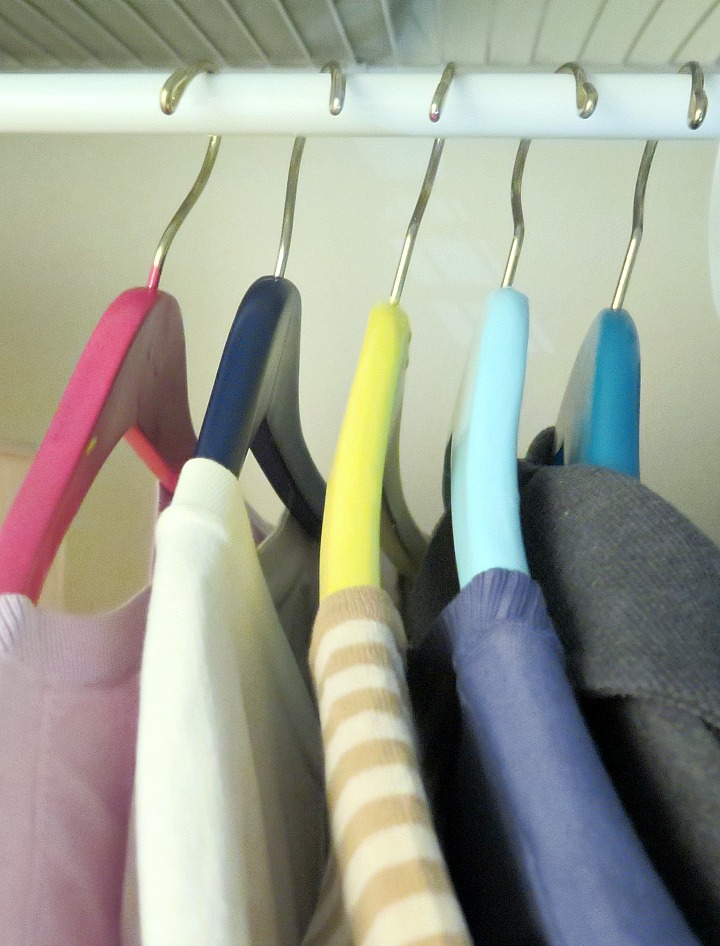 DIY painted wooden hangers and lots of great closet organization tips!